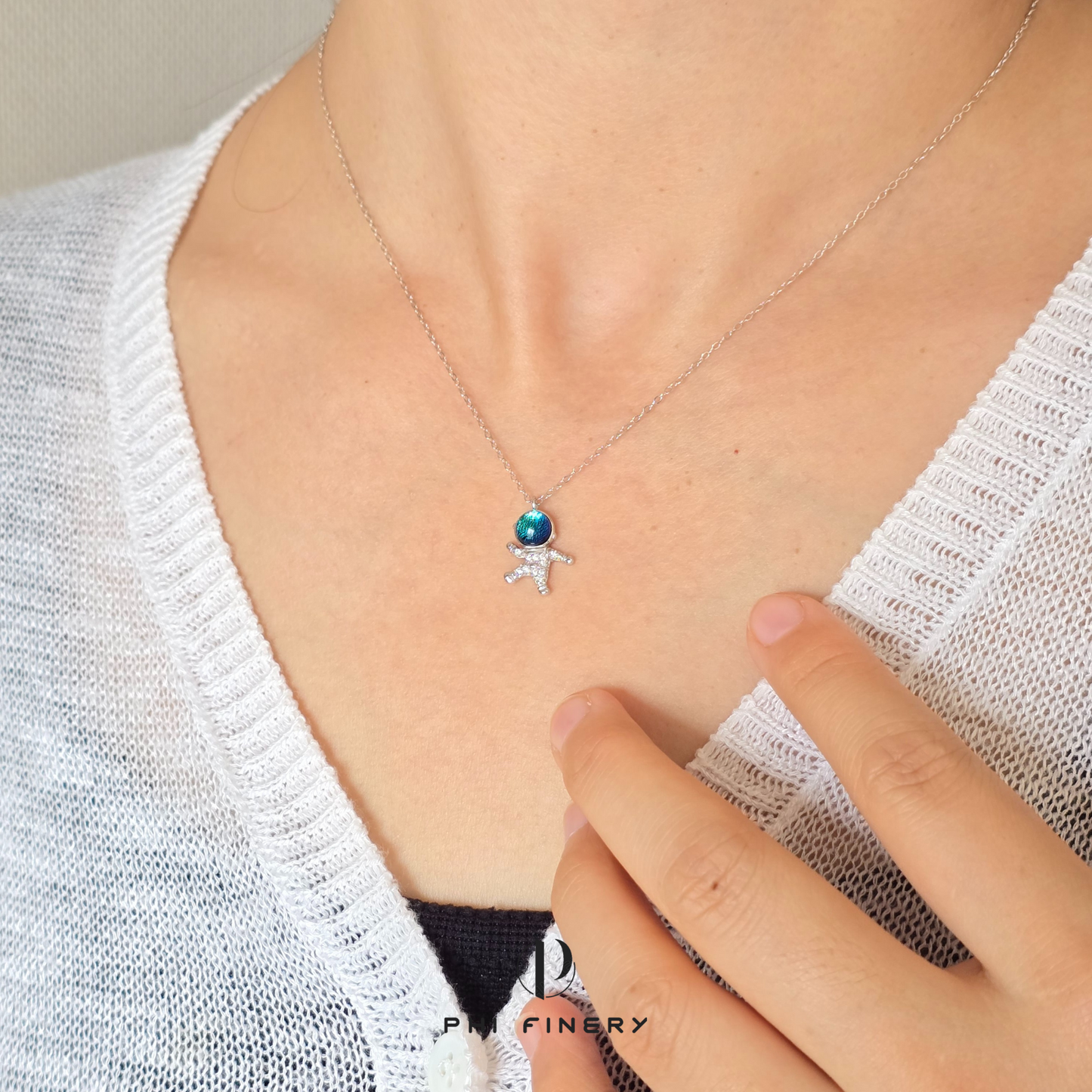 Stellar Triumph Astronaut Necklace
