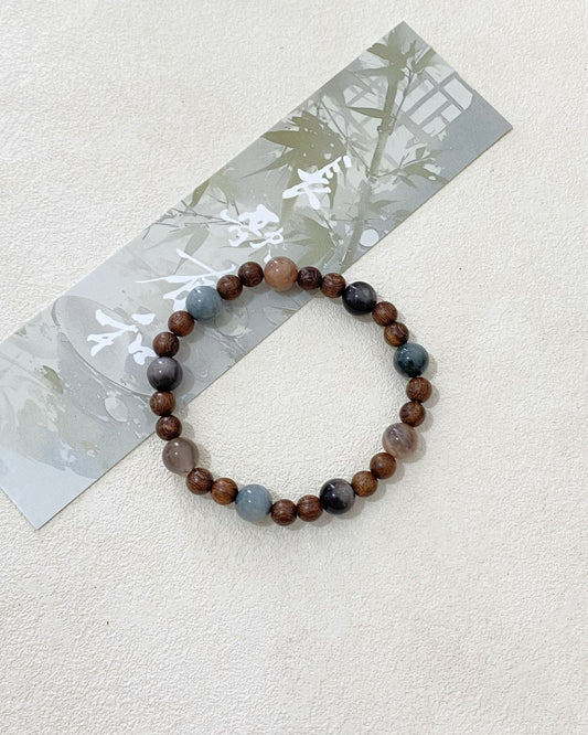 Saturn‑Inspired Golden Nanmu & Crystal Bracelet