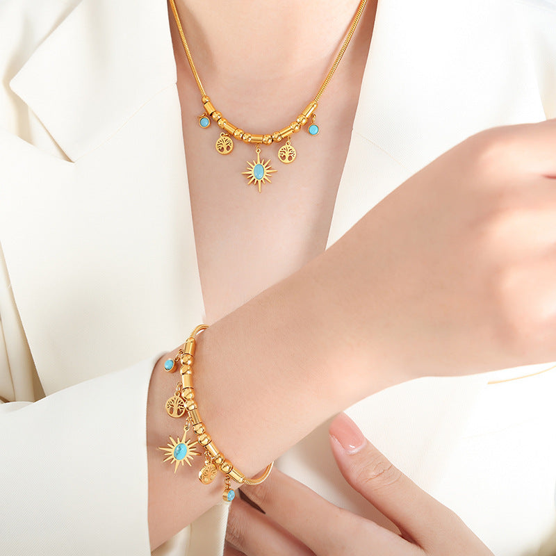 Sunburst Turquoise Charm Set — Gold‑Tone Necklace & Adjustable Bracelet with Tree‑of‑Life Accents