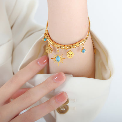 Sunburst Turquoise Charm Set — Gold‑Tone Necklace & Adjustable Bracelet with Tree‑of‑Life Accents