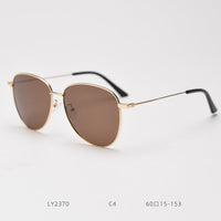 Golden frame brown lens