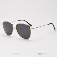Gold frame gray lens